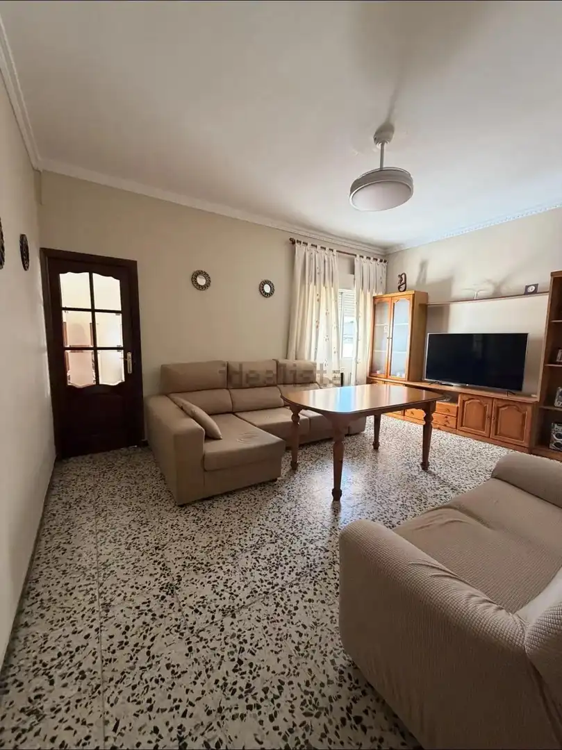 Living room of Single-family semi-detached for sale in Alcalá de Guadaira  with Air Conditioner, Terrace and Storage room
