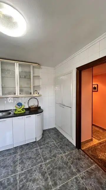 Cuina de Àtic en venda en Gijón  amb Calefacció i Terrassa