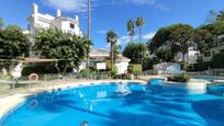 Swimming pool of Planta baja for sale in Marbella  with Air Conditioner, Heating and Terrace