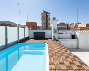 Swimming pool of Attic for sale in  Granada Capital  with Heating, Terrace and Swimming Pool