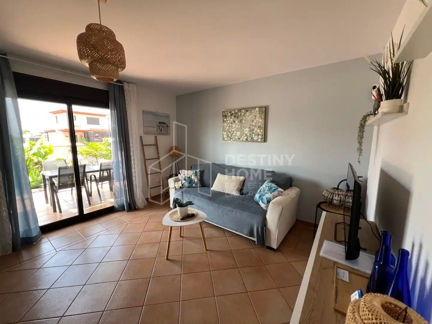 Sala d'estar de Casa adosada en venda en La Oliva amb Jardí privat, Terrassa i Moblat