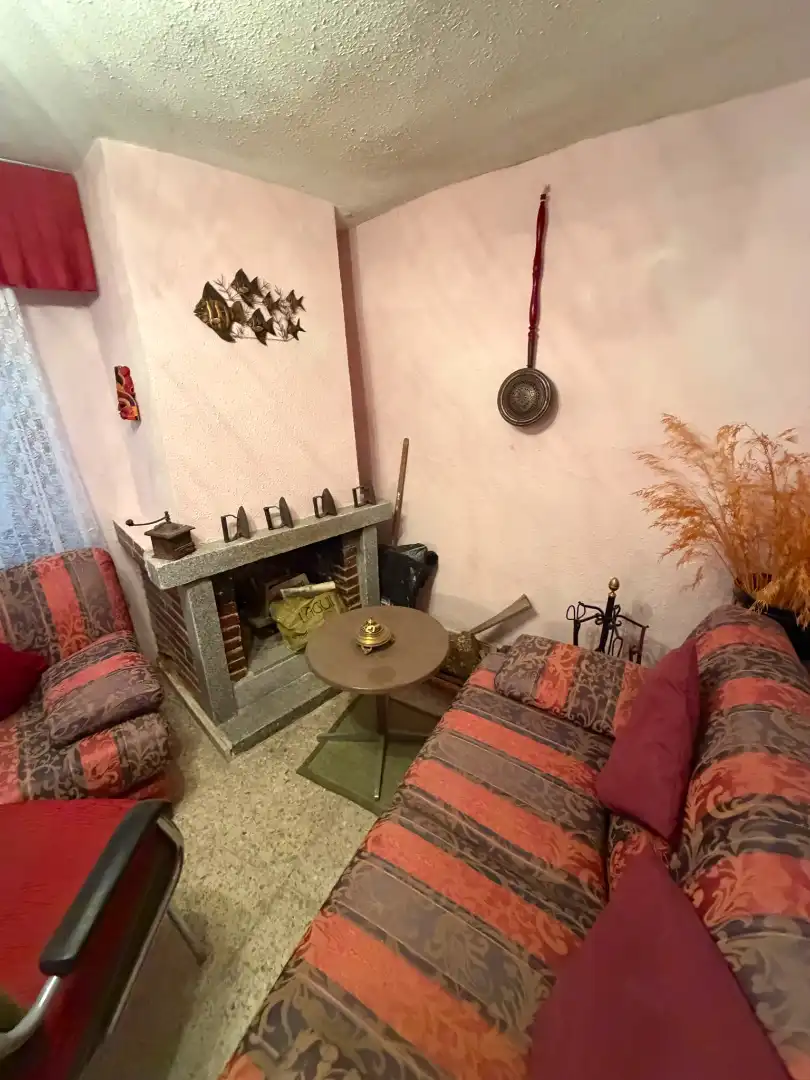 Sala d'estar de Casa adosada en venda en Ávila amb Calefacció