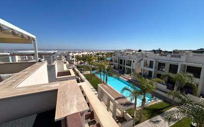 Exterior view of Attic for sale in Torrevieja  with Air Conditioner, Terrace and Storage room