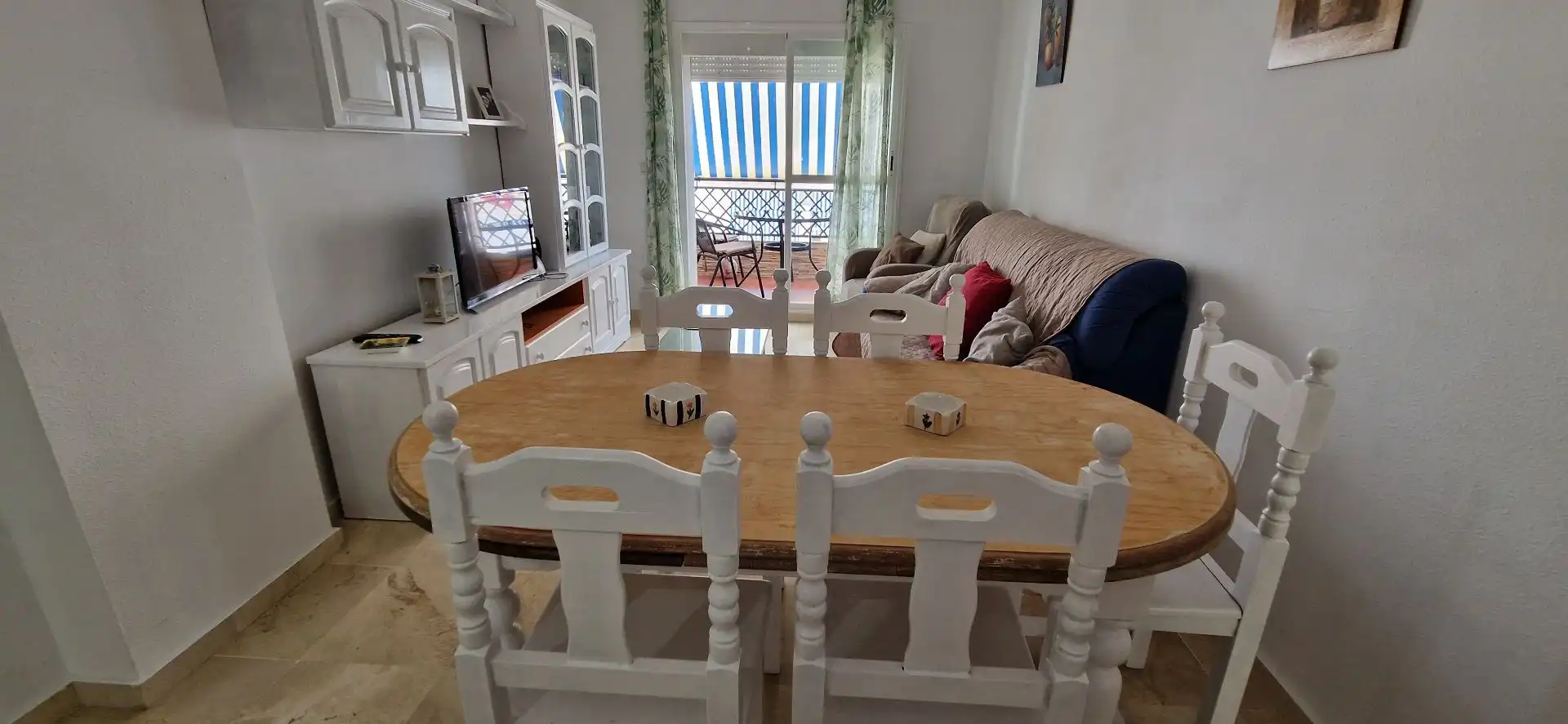 Menjador de Apartament de lloguer en El Portil amb Moblat i Piscina comunitària