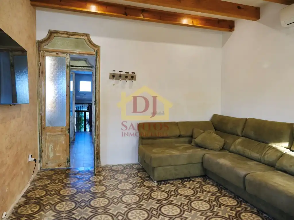 Sala d'estar de Casa adosada en venda en Maó - Mahón