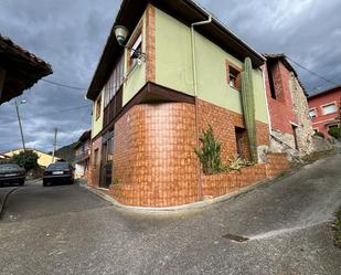 Exterior view of Single-family semi-detached for sale in Piloña  with Private garden, Parquet flooring and Storage room