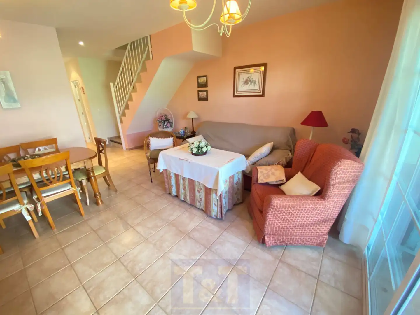 Sala de estar de Casa adosada en venta en Islantilla con Aire acondicionado y Terraza