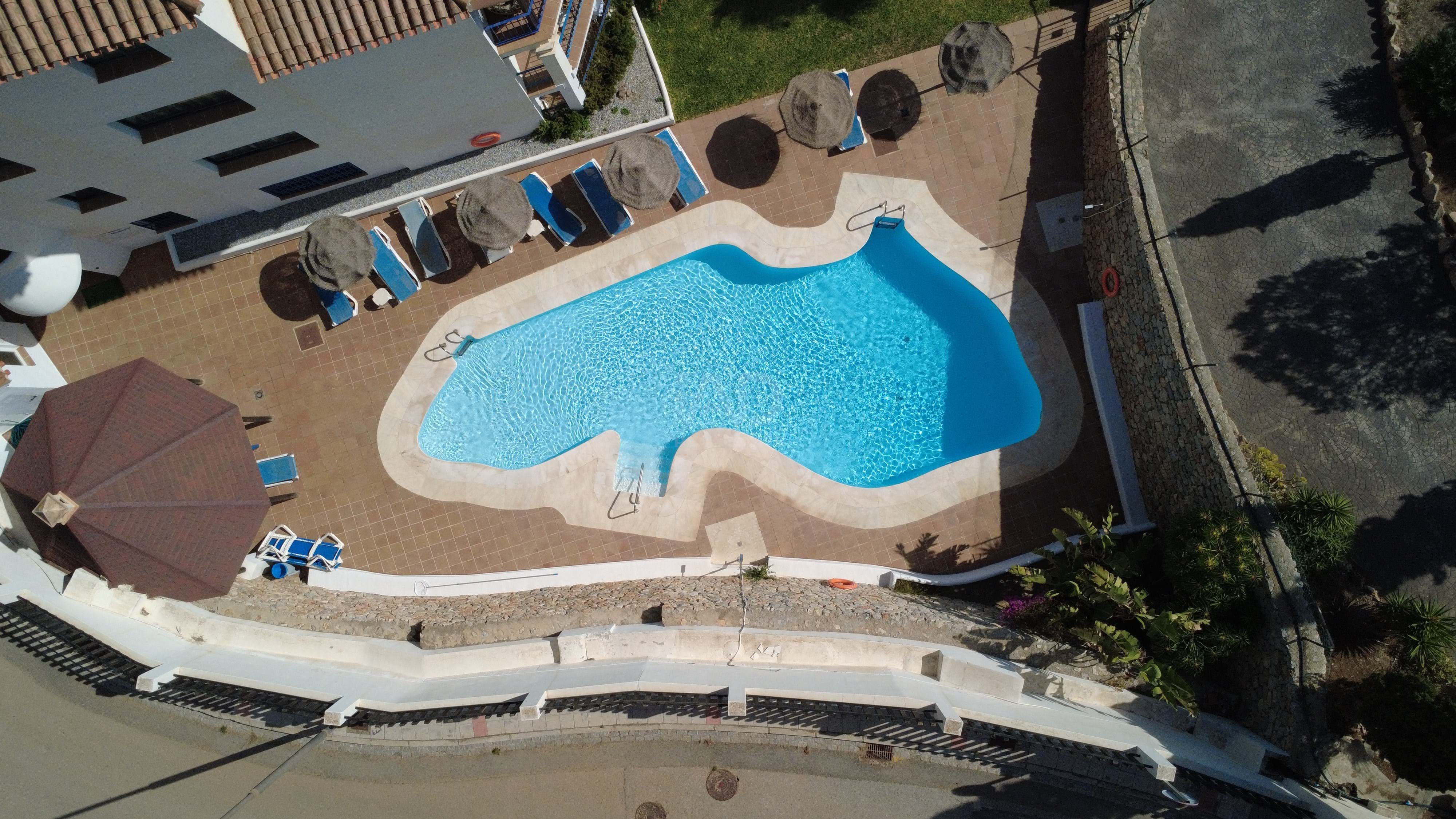 Swimming pool of Flat for sale in Almuñécar  with Air Conditioner, Terrace and Swimming Pool