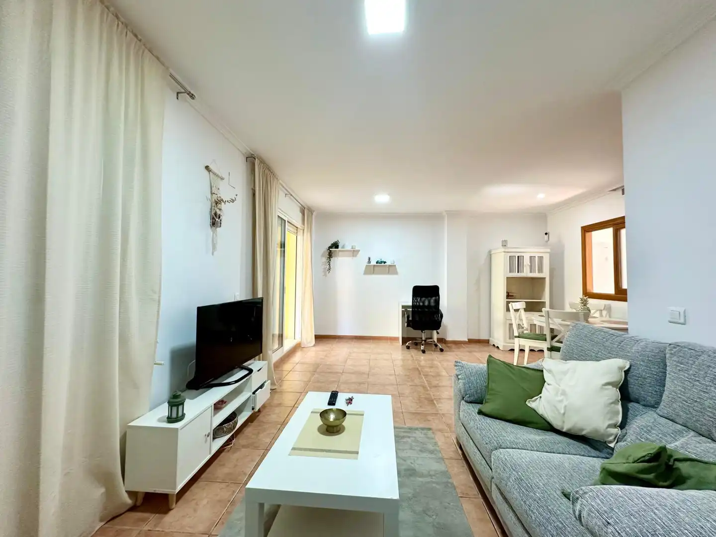 Sala d'estar de Casa adosada de lloguer en Alzira amb Jardí privat, Terrassa i Moblat