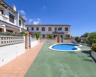 Swimming pool of Single-family semi-detached for sale in El Vendrell  with Air Conditioner, Heating and Terrace