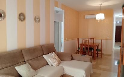 Living room of Flat for sale in Marchena  with Air Conditioner, Terrace and Furnished