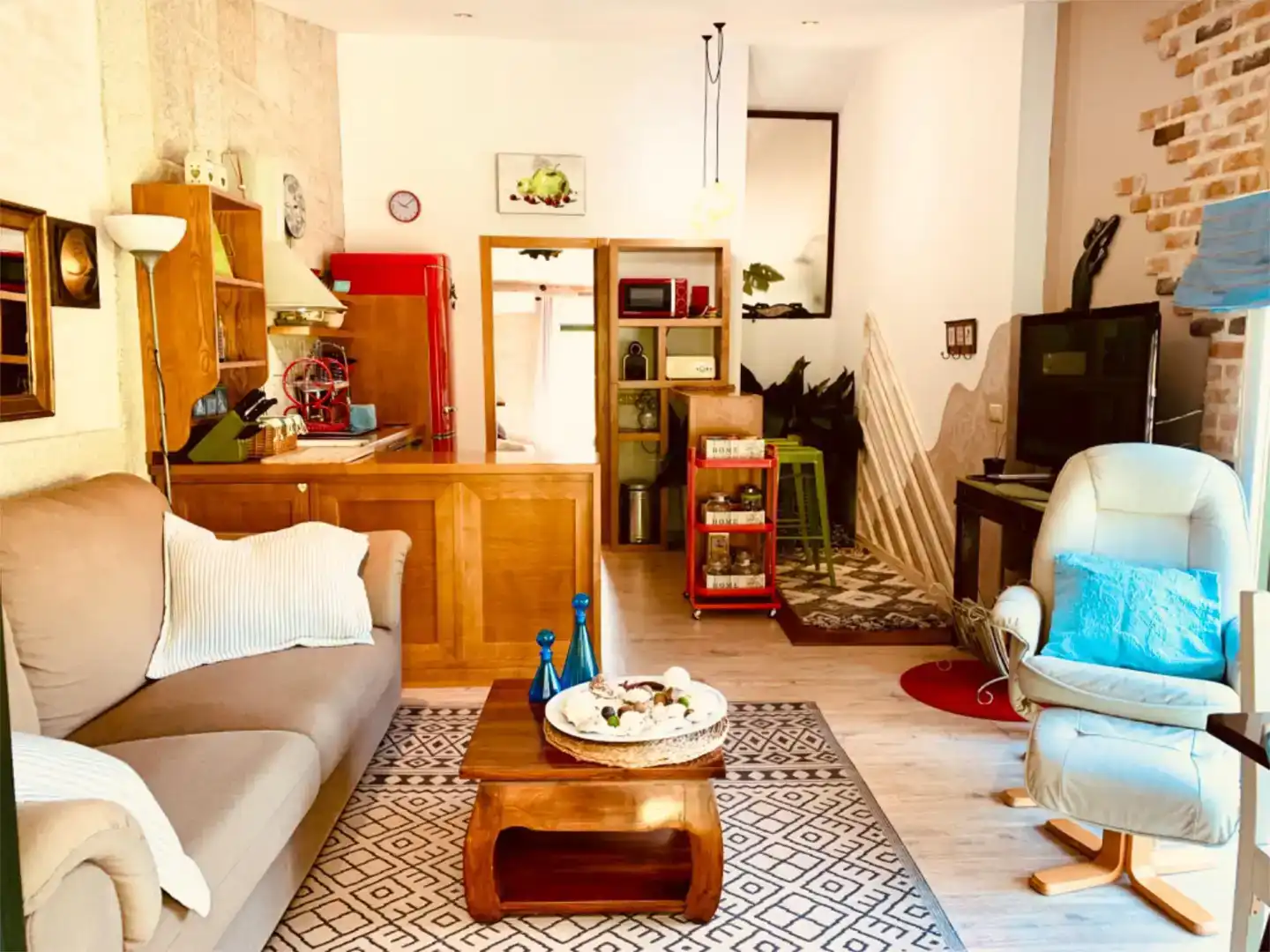 Sala d'estar de Casa adosada de lloguer en Porto do Son amb Aire condicionat, Jardí privat i Moblat