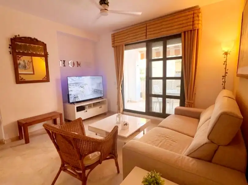 Sala de estar de Apartamento de alquiler en Chipiona con Aire acondicionado, Calefacción y Jardín privado