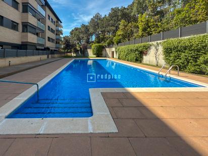 Swimming pool of Flat for sale in Tossa de Mar  with Air Conditioner, Heating and Parquet flooring