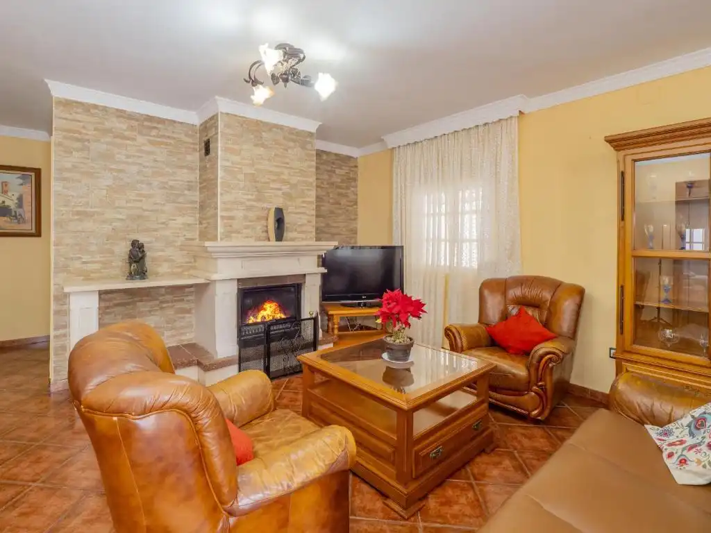 Sala d'estar de Casa o xalet en venda en Málaga amb Jardí privat, Terrassa i Piscina