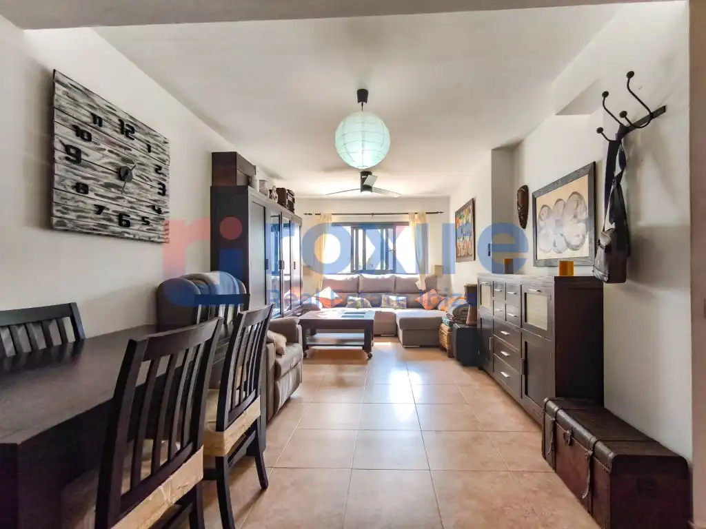 Sala d'estar de Casa adosada en venda en Sant Josep de sa Talaia amb Aire condicionat, Terrassa i Piscina