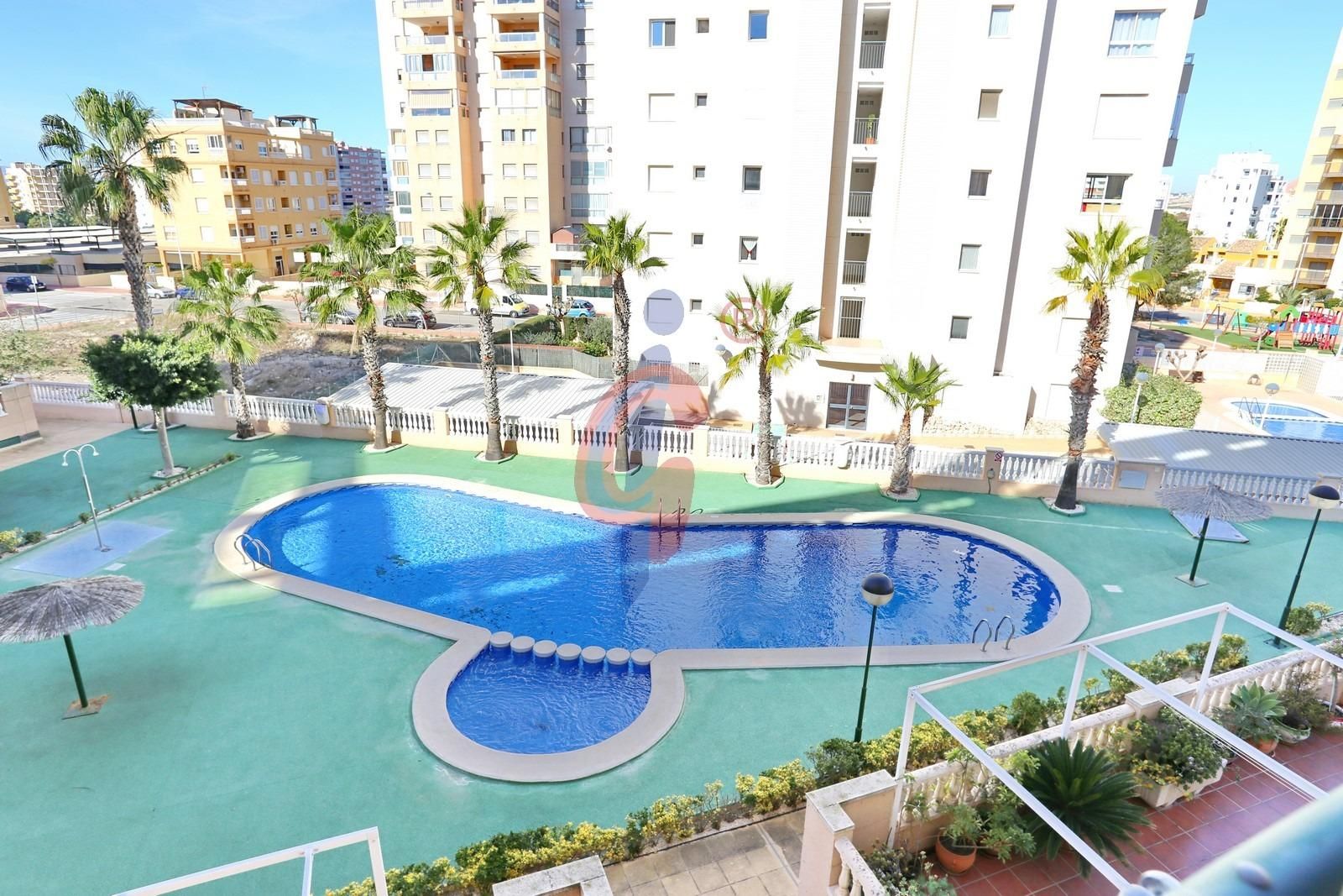 Piscina de Apartamento en venta en Guardamar del Segura con Aire acondicionado, Calefacción y Jardín privado