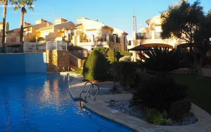 Piscina de Casa adosada en venda en Monforte del Cid amb Aire condicionat, Calefacció i Jardí privat