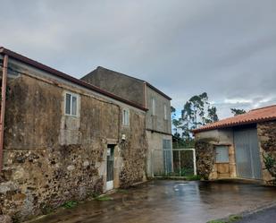 Vista exterior de Finca rústica en venda en Carballo amb Jardí privat