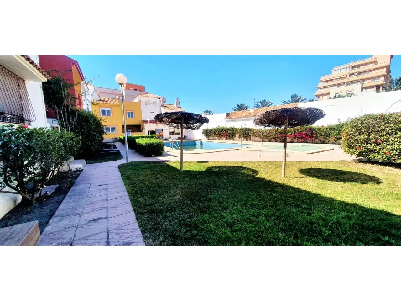 Garden of Detached homes for sale in Roquetas de Mar  with Terrace, Furnished and Community pool