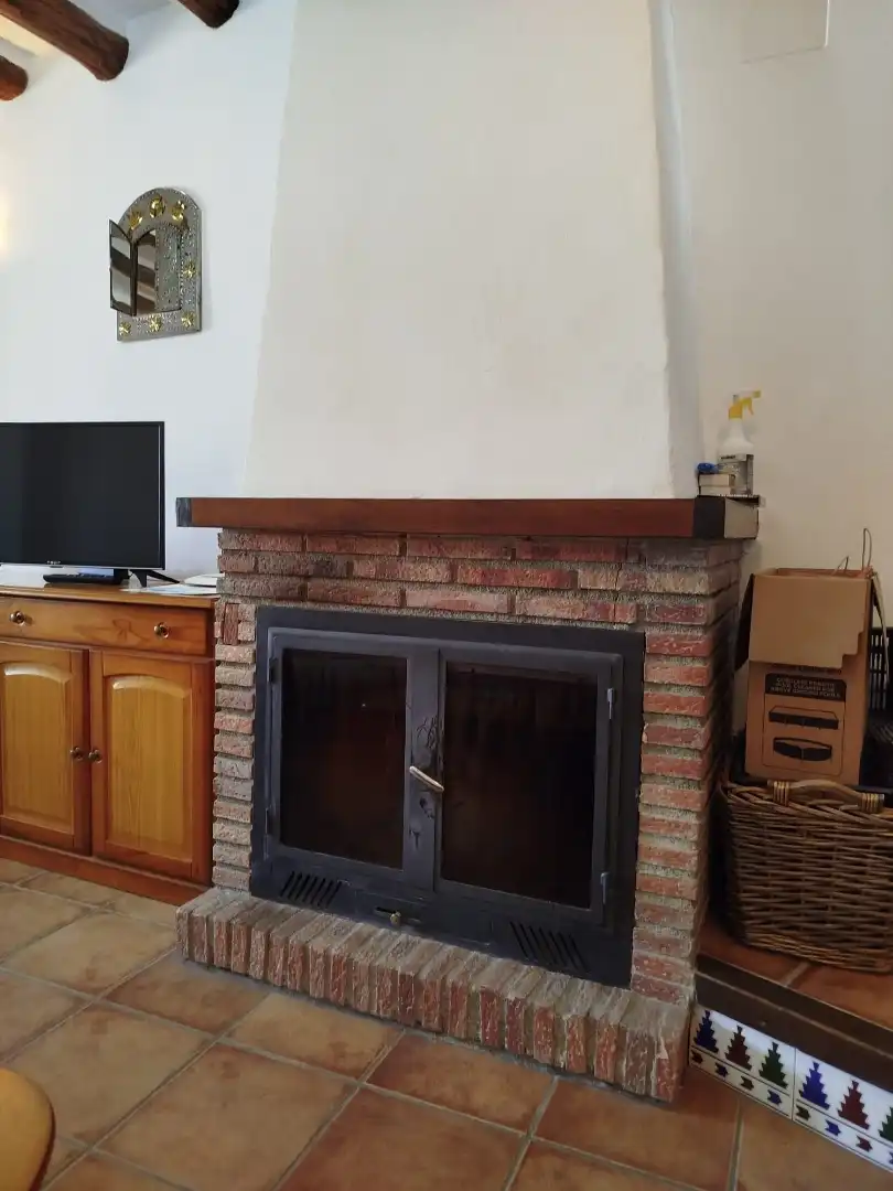 Sala d'estar de Casa adosada en venda en Nevada amb Calefacció, Terrassa i Moblat