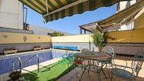 Jardí de Casa adosada en venda en Cúllar Vega amb Aire condicionat i Piscina