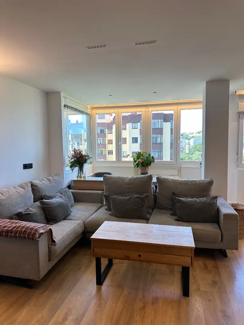 Sala de estar de Piso en venta en Castrillón con Calefacción, Parquet y Internet