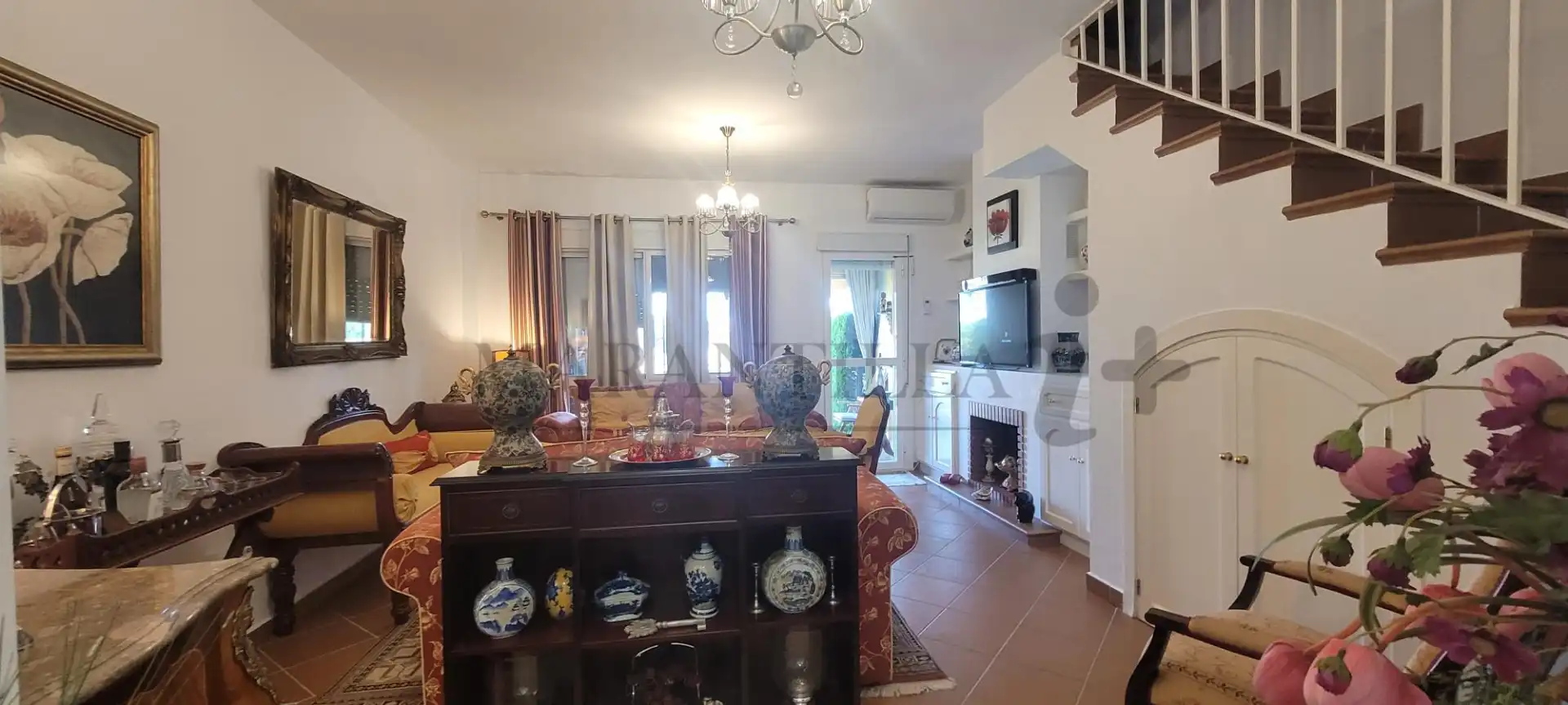 Sala de estar de Casa adosada en venta en Islantilla con Aire acondicionado, Calefacción y Jardín privado