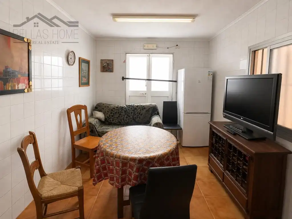 Sala d'estar de Casa adosada en venda en Estepona amb Moblat