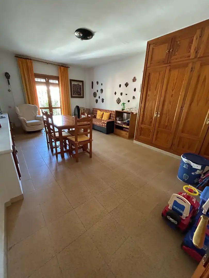 Sala d'estar de Casa adosada en venda en Vélez-Málaga amb Aire condicionat, Calefacció i Jardí privat