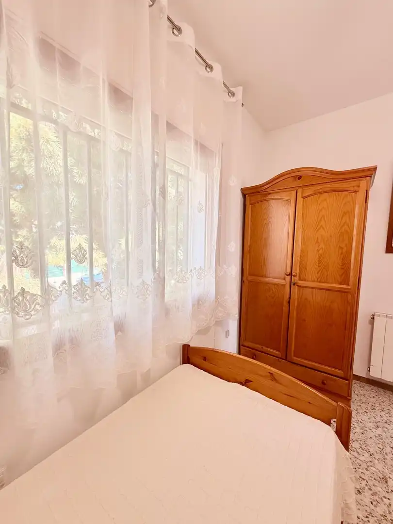 Schlafzimmer von Haus oder Chalet zum Verkauf in Calafell mit Klimaanlage, Heizung und Privatgarten