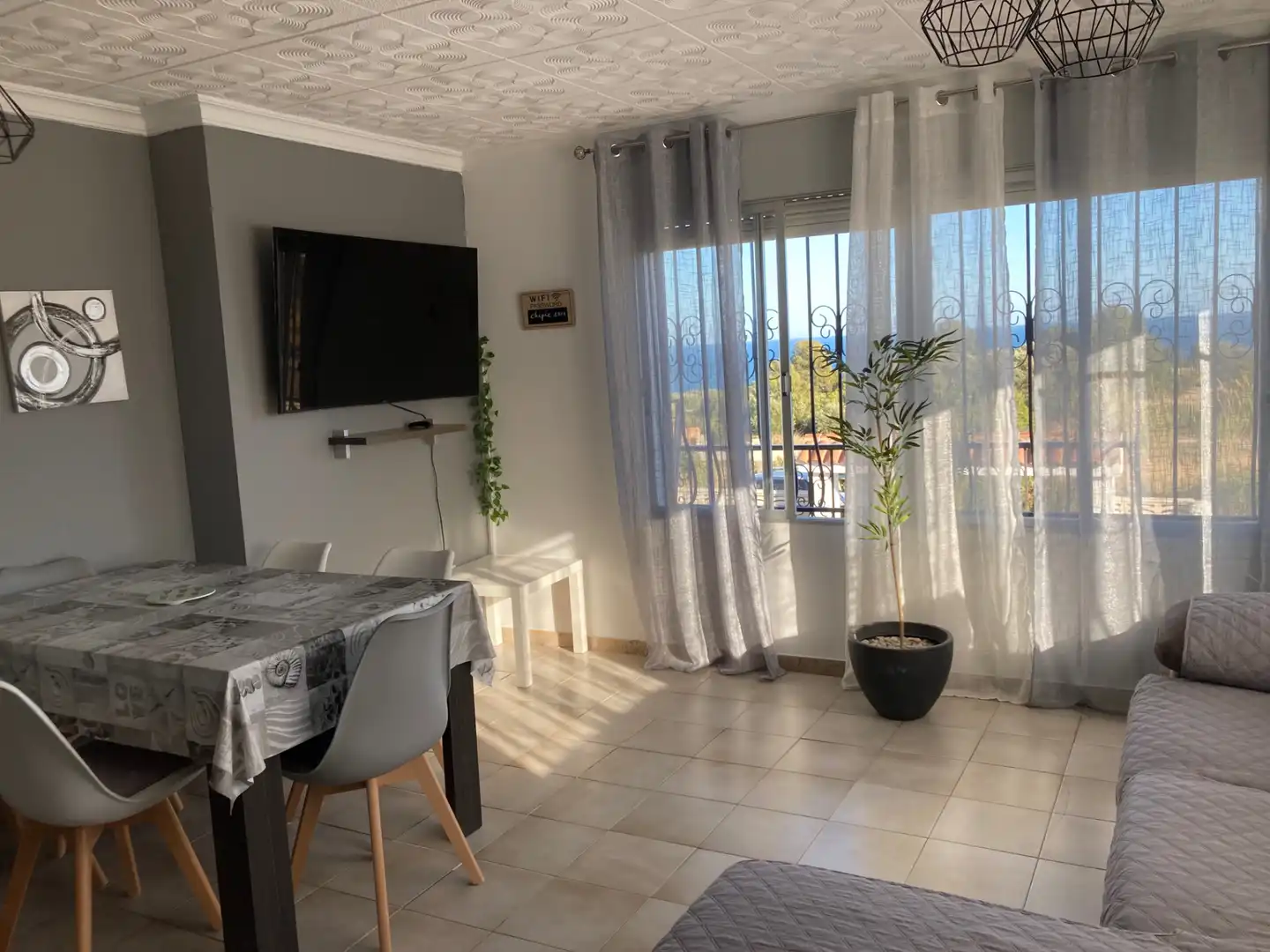 Sala d'estar de Casa o xalet de lloguer en Peñíscola / Peníscola amb Aire condicionat, Jardí privat i Terrassa