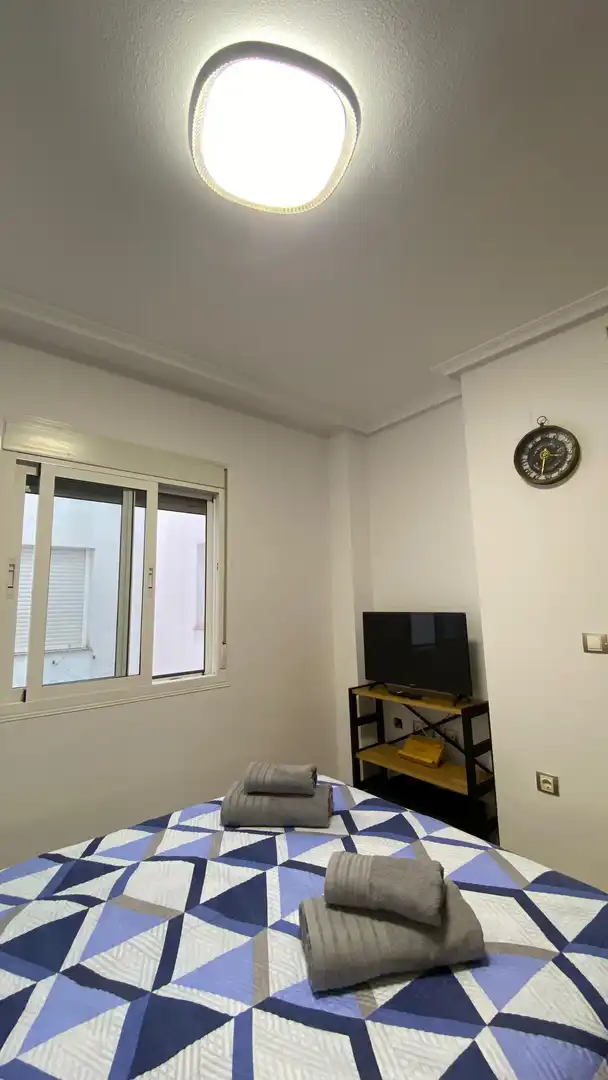 Habitación de Piso de alquiler en Rojales con Aire acondicionado, Terraza y Piscina comunitaria