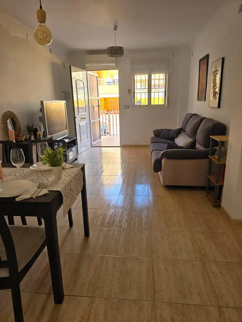 Sala de estar de Planta baja en venta en Tavernes de la Valldigna con Terraza y Piscina comunitaria