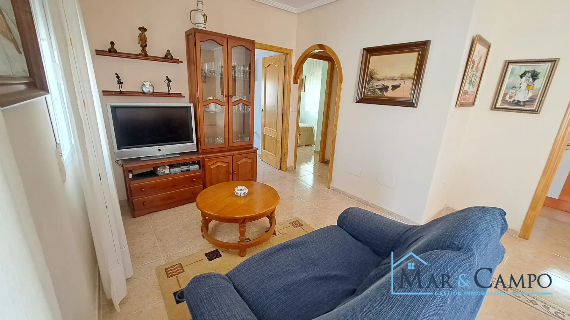 Sala de estar de Casa adosada en venta en Los Alcázares con Aire acondicionado, Jardín privado y Amueblado