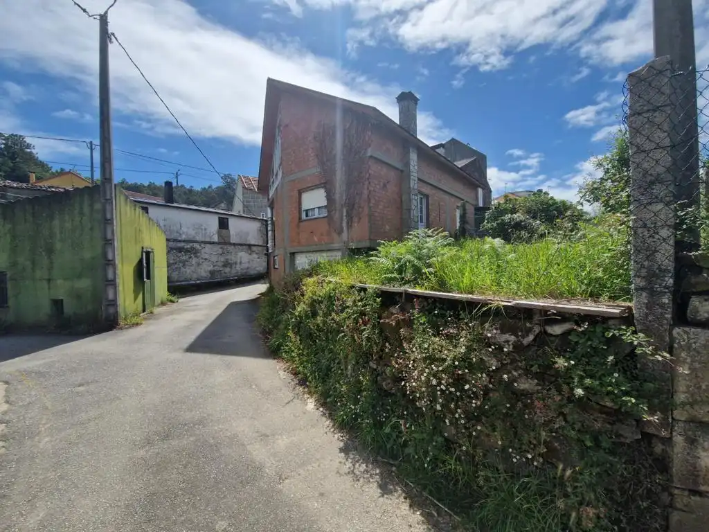 Vista exterior de Casa o xalet en venda en Rianxo amb Jardí privat, Traster i Balcó