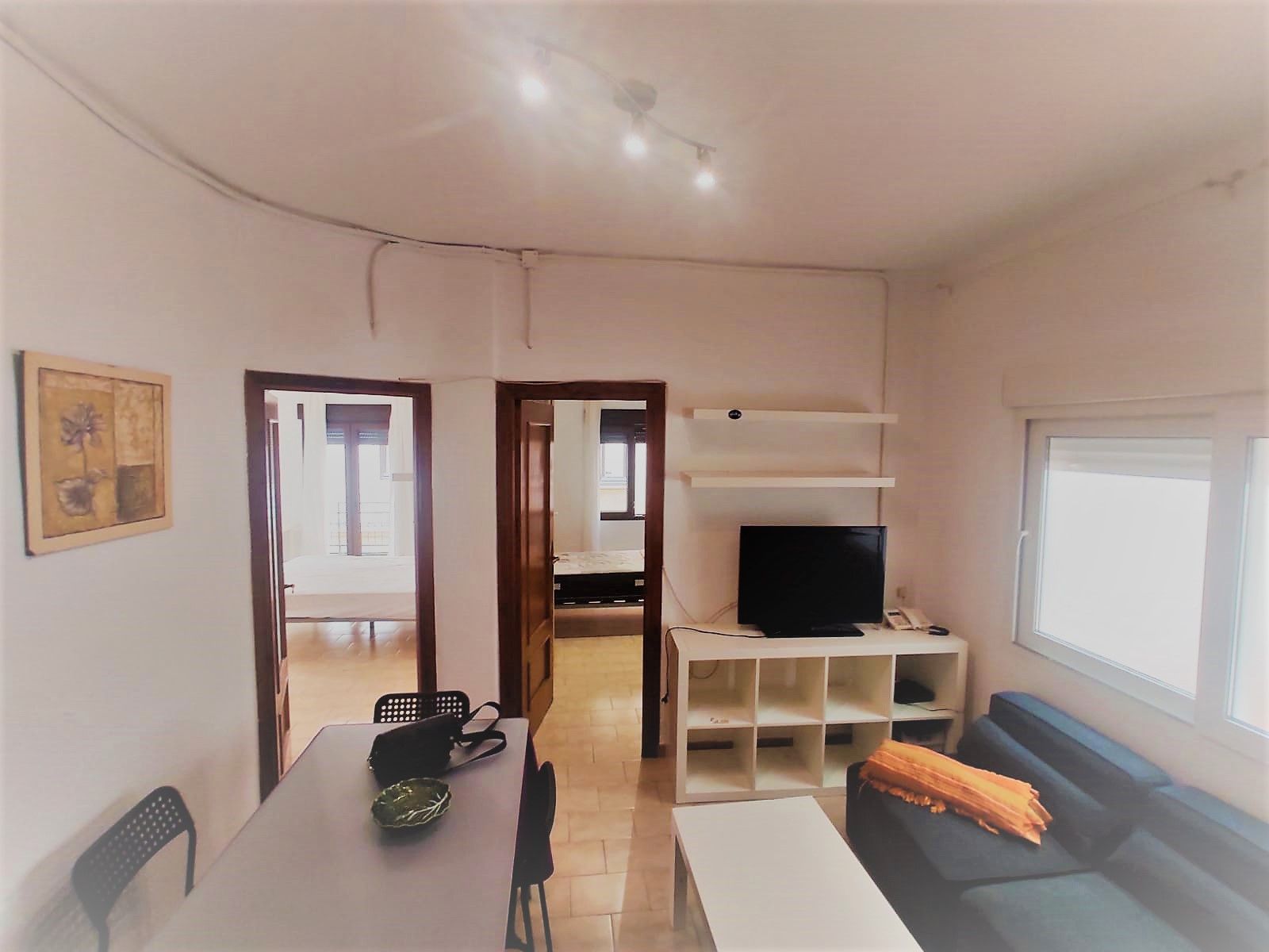 Living room of Flat for sale in  Granada Capital  with Air Conditioner, Furnished and Oven