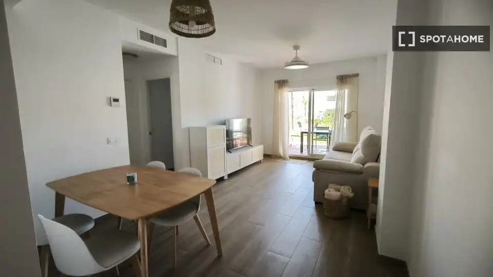 Sala de estar de Apartamento para compartir en Chipiona con Aire acondicionado, Terraza y Amueblado