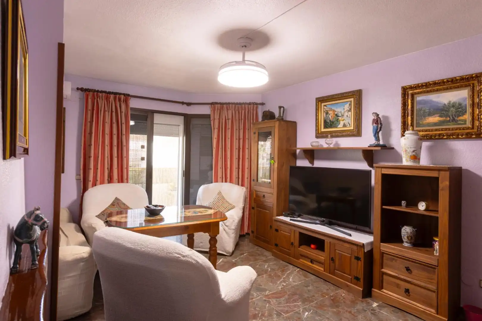 Wohnzimmer von Wohnung zum Verkauf in Almuñécar mit Klimaanlage, Privatgarten und Terrasse