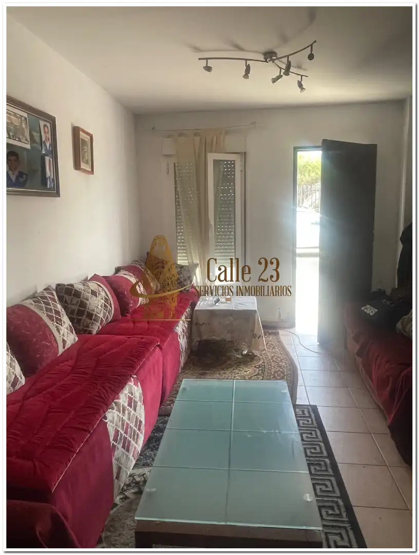 Sala de estar de Casa adosada en venta en San Juan del Puerto con Terraza