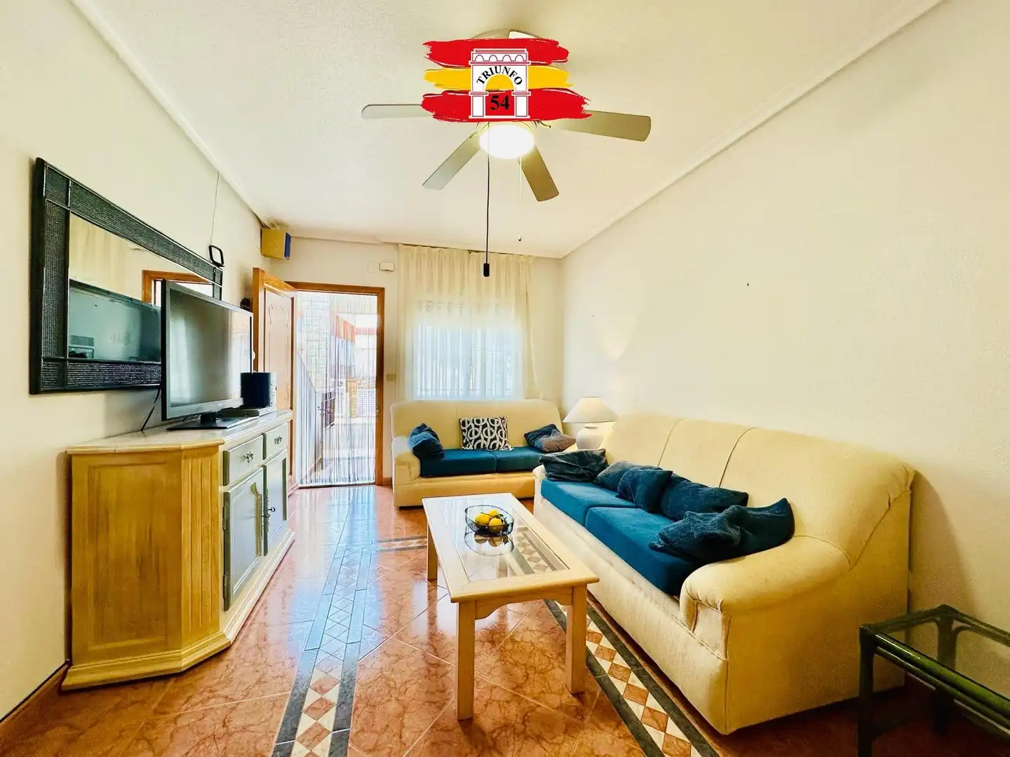 Sala de estar de Casa adosada en venta en Pilar de la Horadada con Aire acondicionado, Terraza y Amueblado