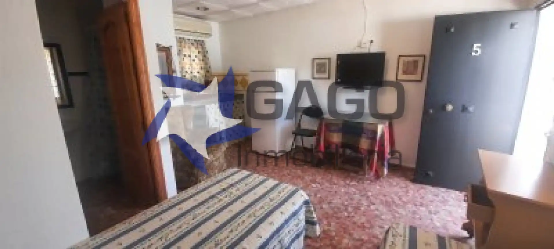 Sala d'estar de Estudi de lloguer en Córdoba amb Aire condicionat i Moblat