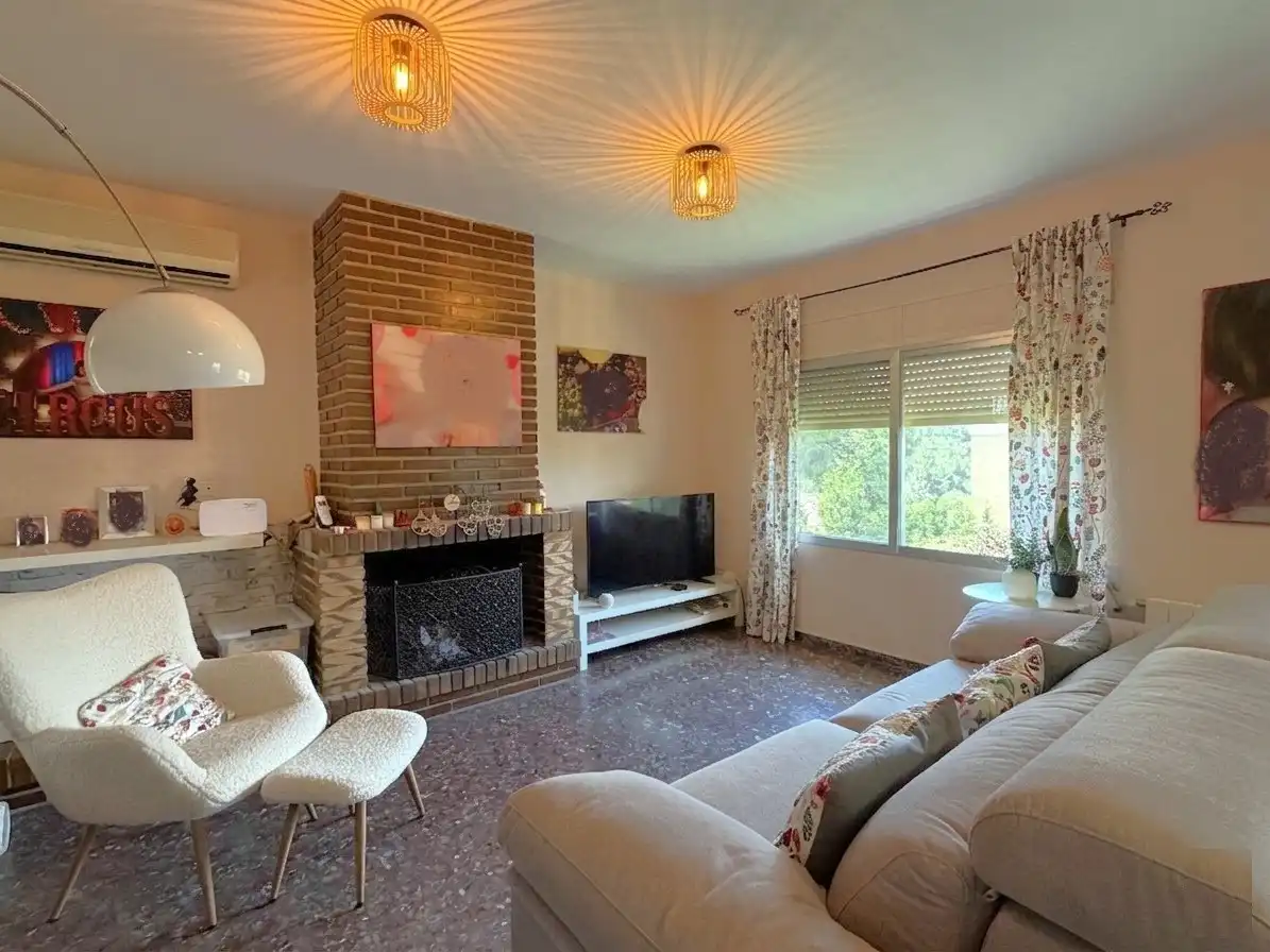 Sala de estar de Casa o chalet en venta en Náquera con Aire acondicionado, Calefacción y Jardín privado