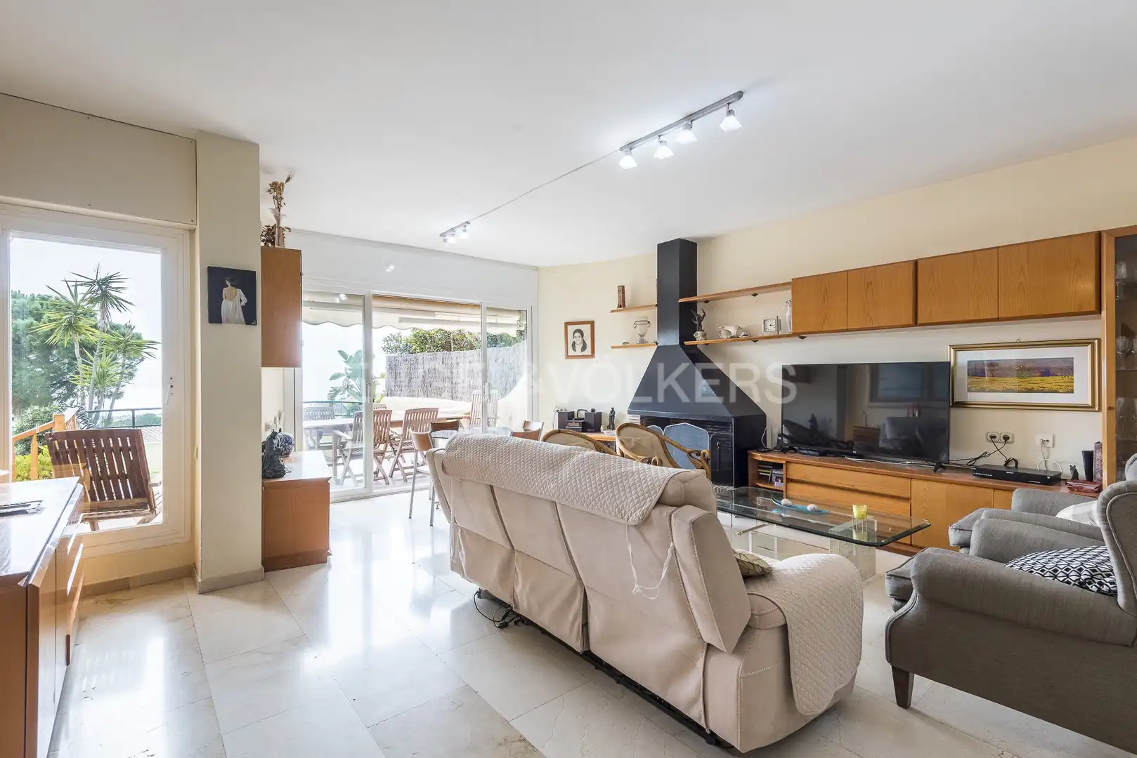Sala d'estar de Casa adosada en venda en Sitges amb Aire condicionat, Calefacció i Jardí privat