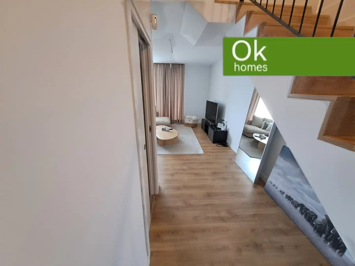 Sala de estar de Casa adosada en venta en Oleiros con Calefacción, Parquet y Terraza