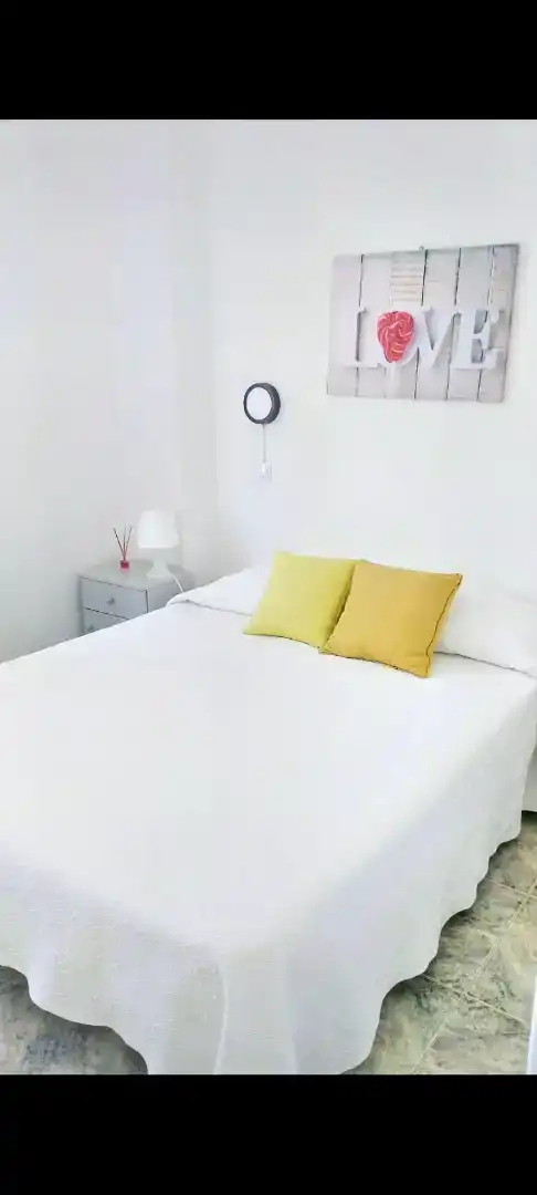 Dormitori de Casa adosada de lloguer en Telde amb Aire condicionat