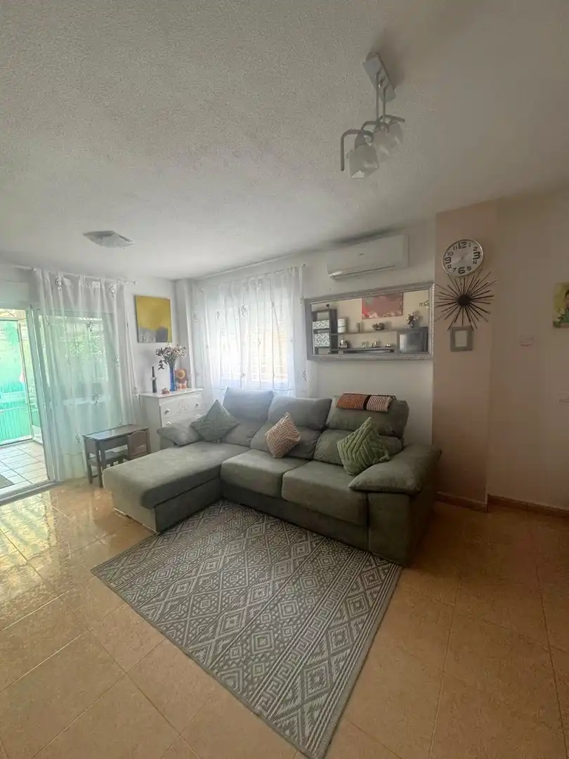 Sala de estar de Casa adosada en venta en Pozo de Guadalajara con Aire acondicionado, Calefacción y Jardín privado
