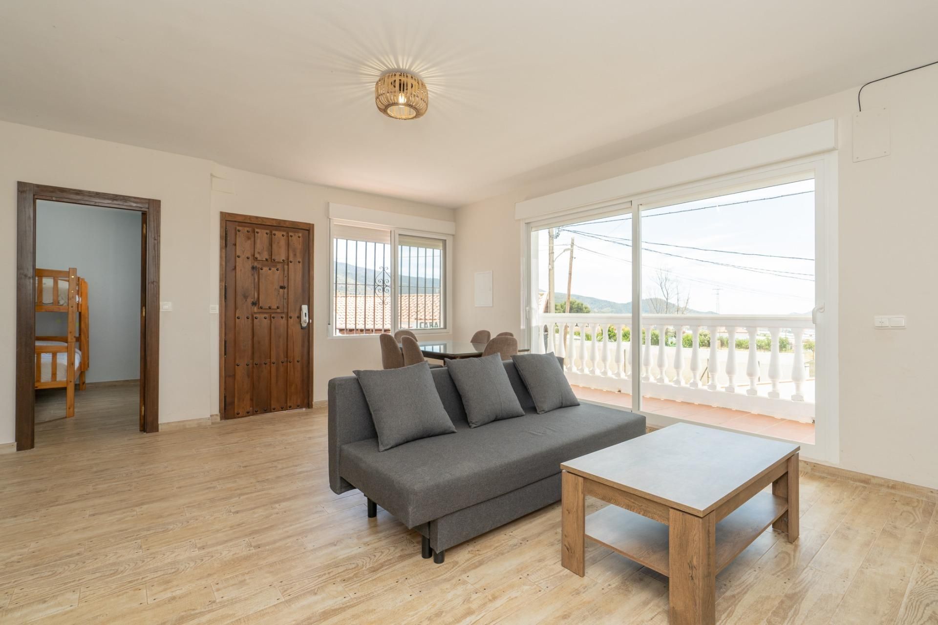 Sala d'estar de Casa o xalet en venda en Motril amb Aire condicionat, Jardí privat i Terrassa