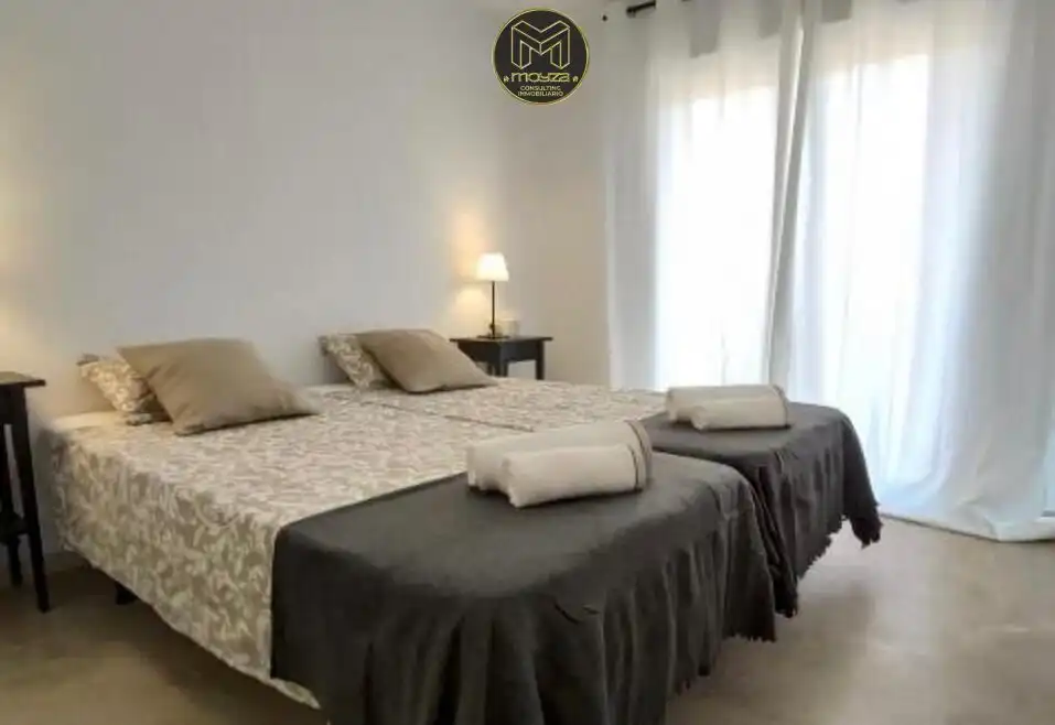 Dormitori de Casa adosada de lloguer en Manilva amb Aire condicionat