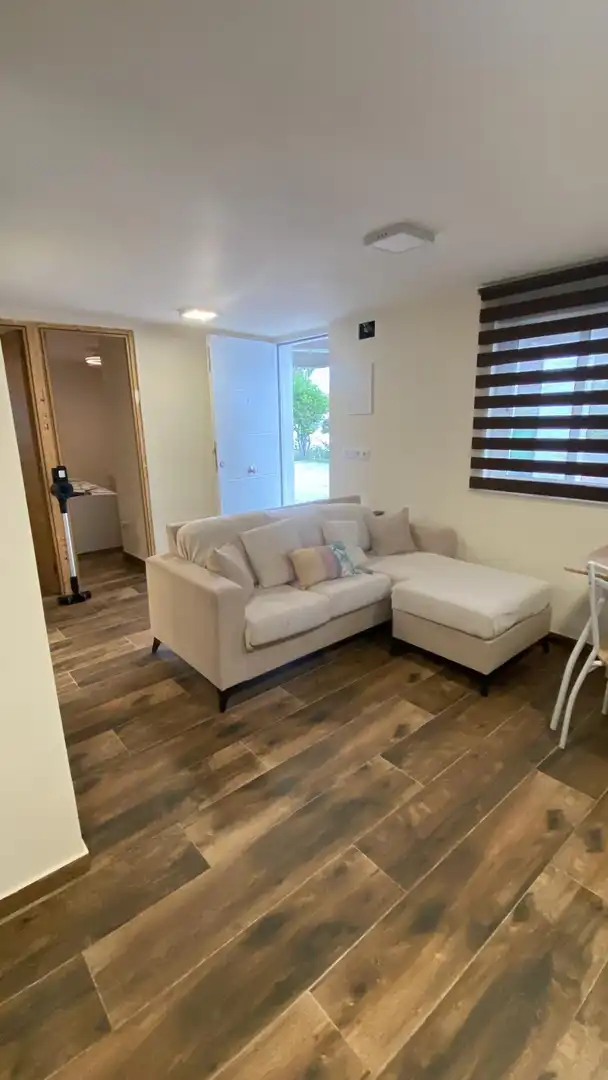 Sala d'estar de Casa o xalet en venda en La Pobla de Vallbona amb Aire condicionat, Terrassa i Piscina comunitària